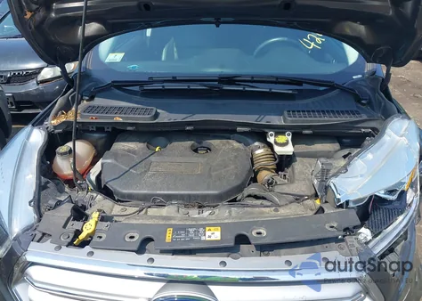 2017 Ford Escape Titanium z USA, uszkodzony, nr VIN 1FMCU9J99HUE27597